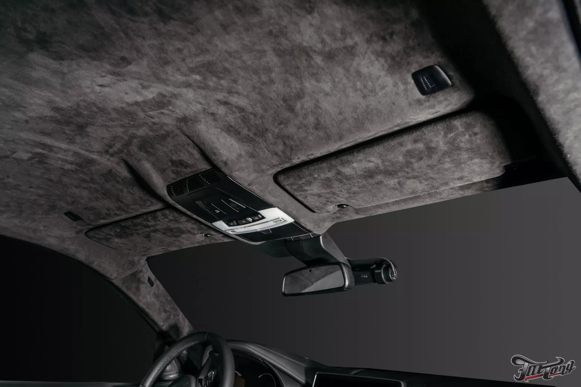 BMW X6. Перетяжка потолка в алькантару. Установка дополнительных сеток в бампер